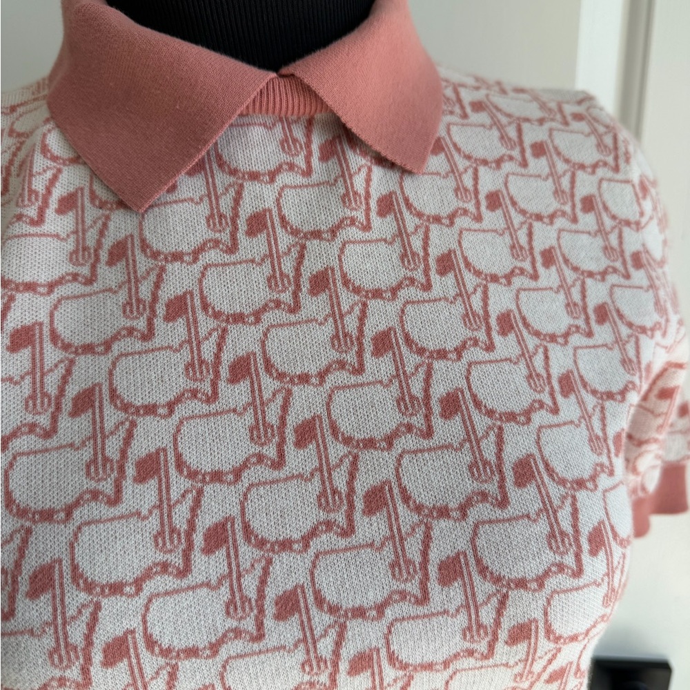 Master’s blush pink sweater with repeating logo